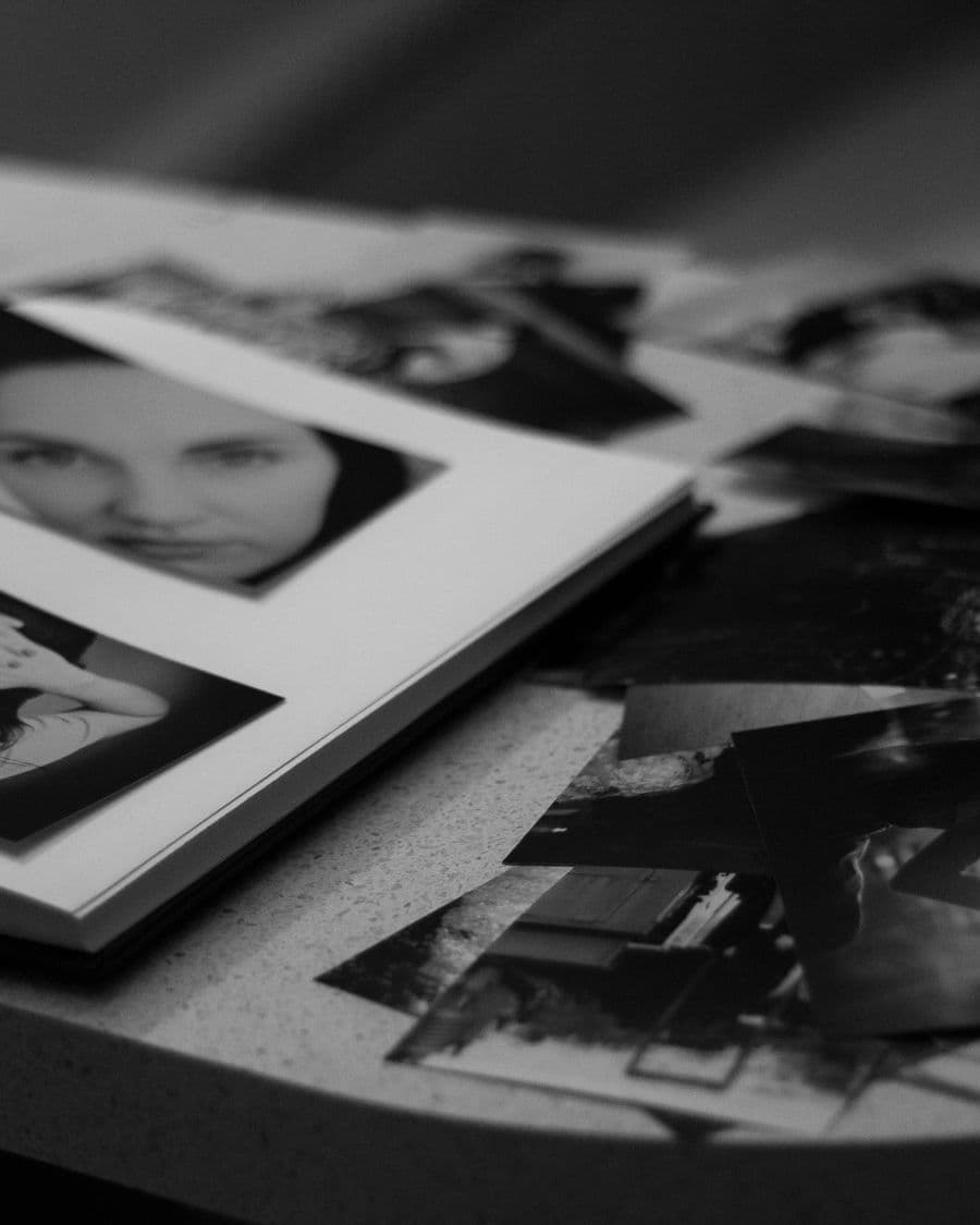 Black and white fine-art prints laid out on a table