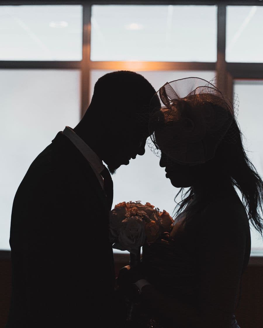Couple sharing a quiet moment in low light
